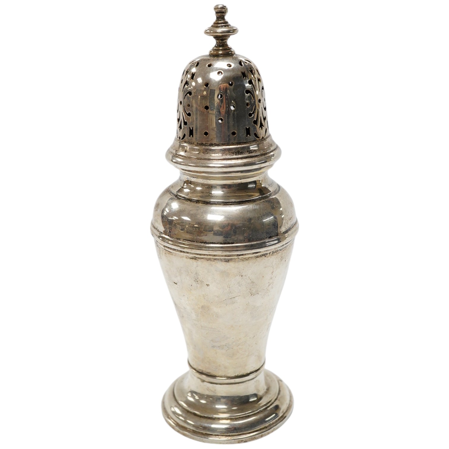 A George VI silver sugar caster, by William Comyns & Sons Ltd, London, 1936, 16.1cm, 5oz. Condition - fair